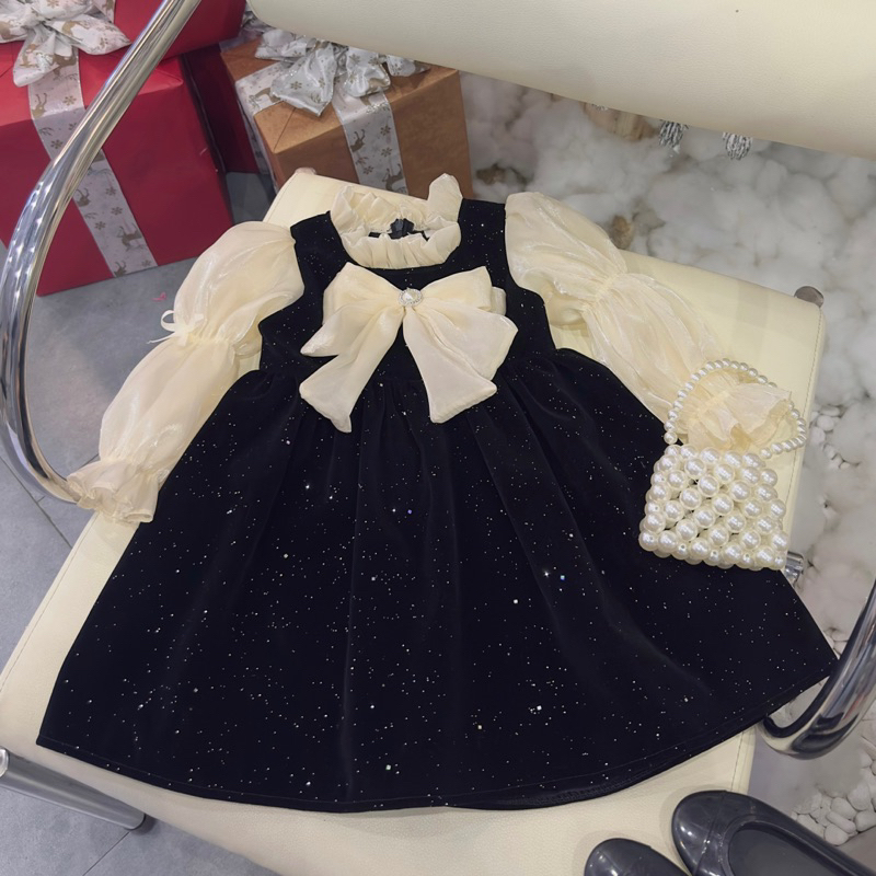 Váy nhung đen nhũ phối tay nơ voan bé gái