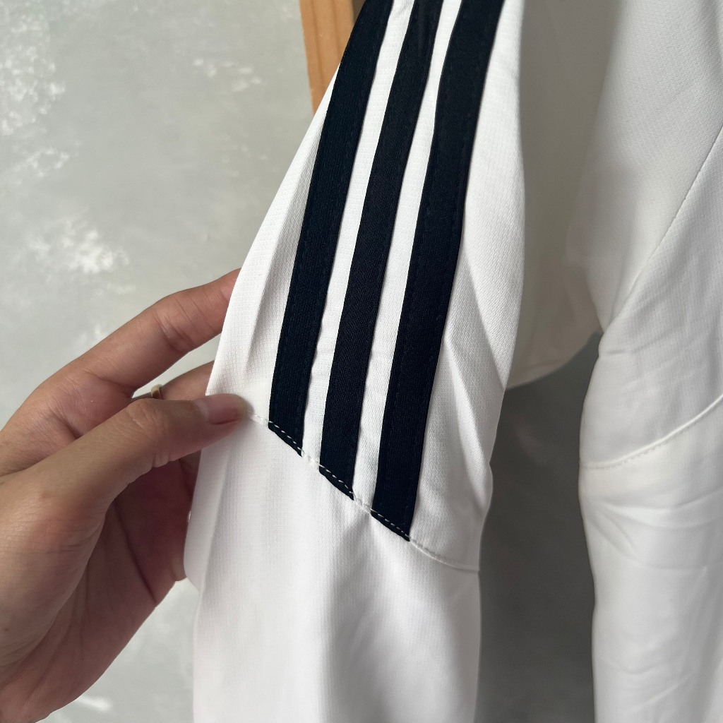 Áo khoác gió đội tuyển Quốc gia Đức WC 2022 trắng sọc vai