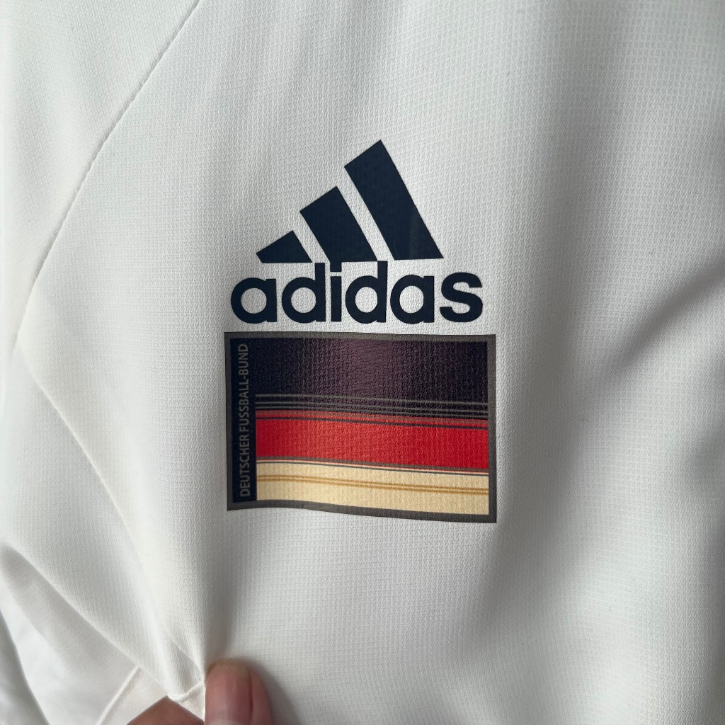 Áo khoác gió đội tuyển Quốc gia Đức WC 2022 trắng sọc vai