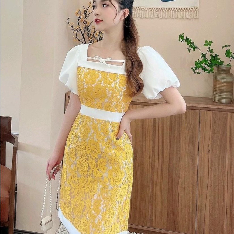 đầm vàng tay bồng