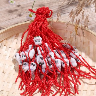 Vòng tay chỉ đỏ mèo Maneki Neko thần tài may mắn