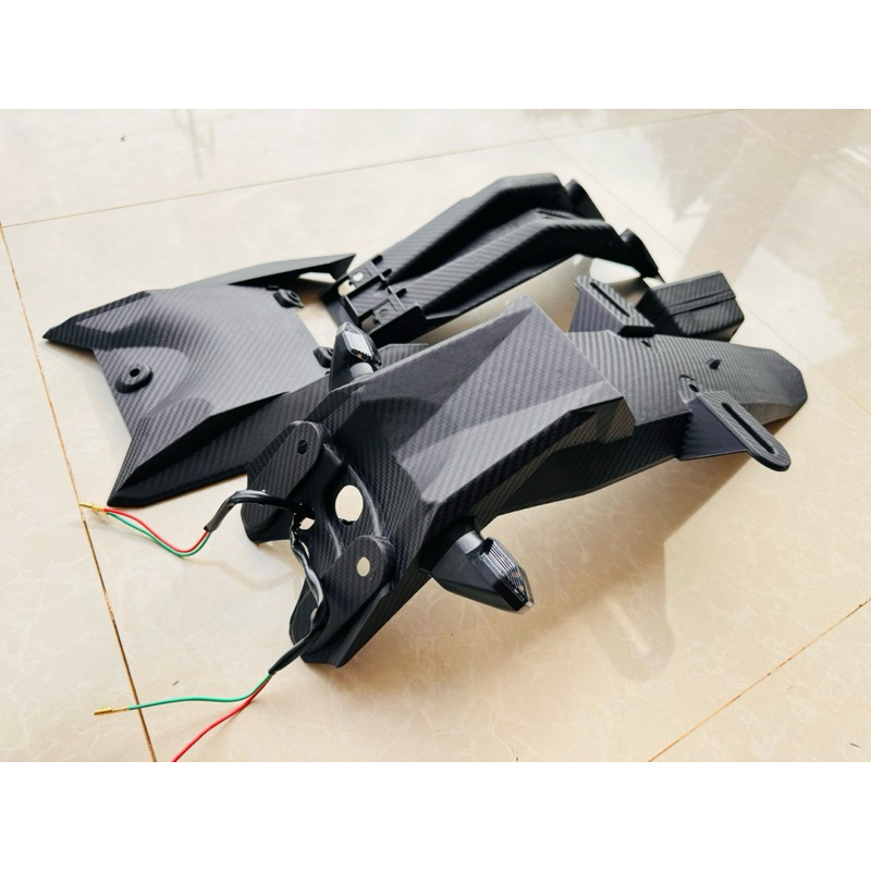 Dè chống gãy vân Carbon Raider và Satria