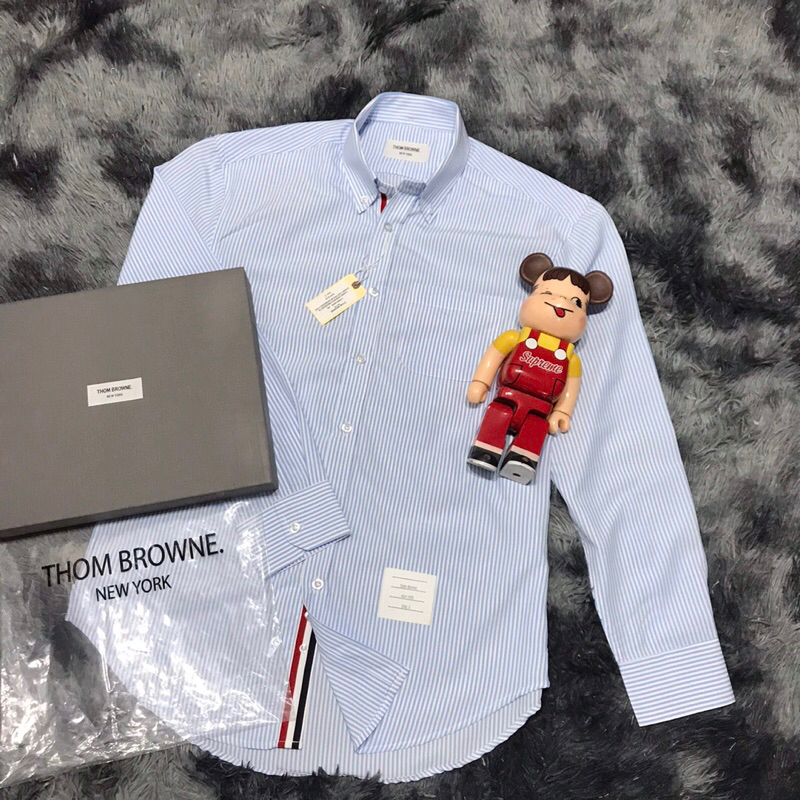 Áo thom brown sọc xanh viền trong  không nhăn