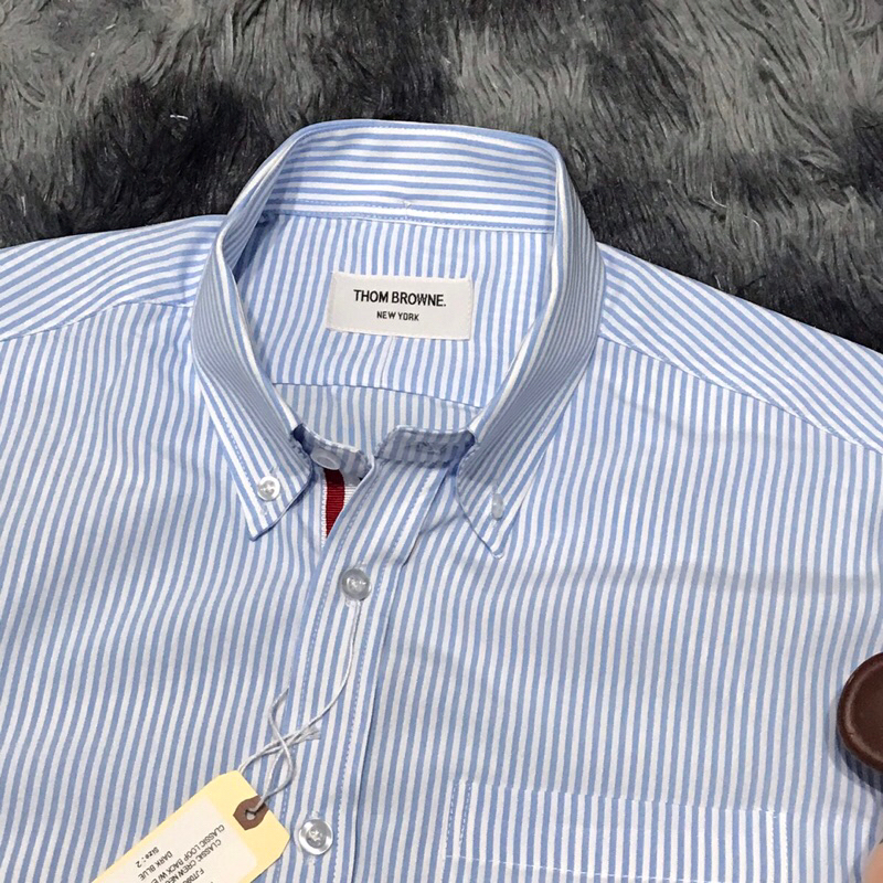 Áo thom brown sọc xanh viền trong  không nhăn