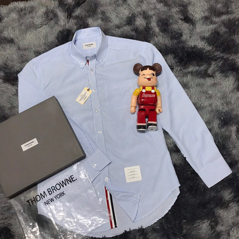 Áo thom brown sọc xanh viền trong  không nhăn