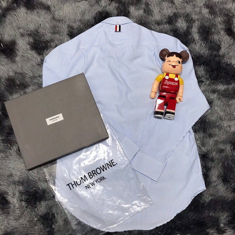 Áo thom brown sọc xanh viền trong  không nhăn