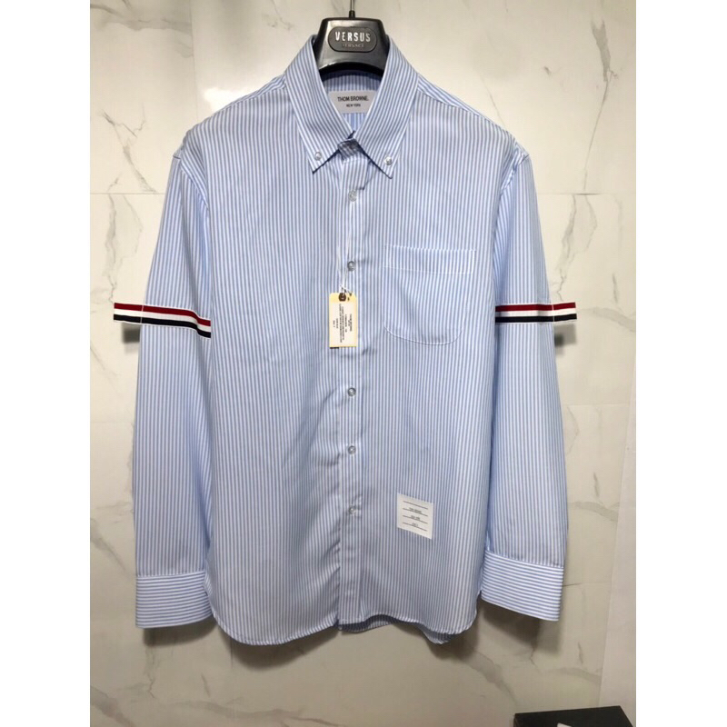 Áo thom brown sọc xanh nhạt viền 2 tay  không nhăn