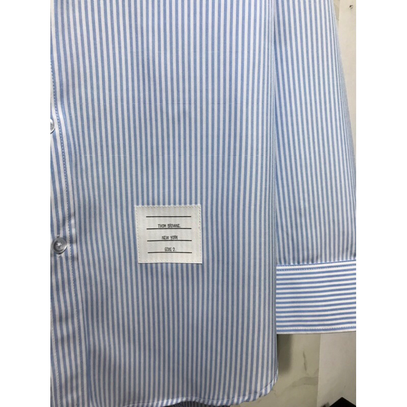 Áo sơ mi thom brown sọc xanh viền 2 tay