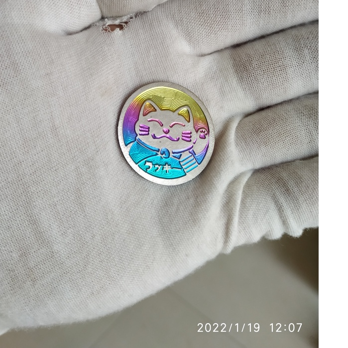 Tem titan mèo thần tài  đường kính 3cm 4cm