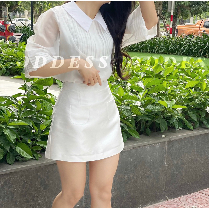 Chân váy chữ A có 2 túi trước chất liệu tafta có lót quần bên trong