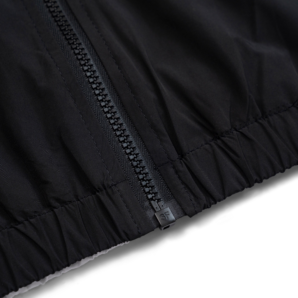 Áo khoác gió dù Sporty hống thấm nước thoáng khí , dang rộng nam nữ - Snomad