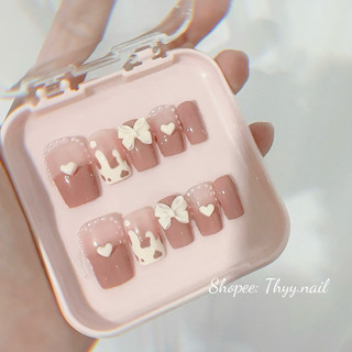 Nailbox màu hồng đất gắn charm nơ trái tim Thyy.nail