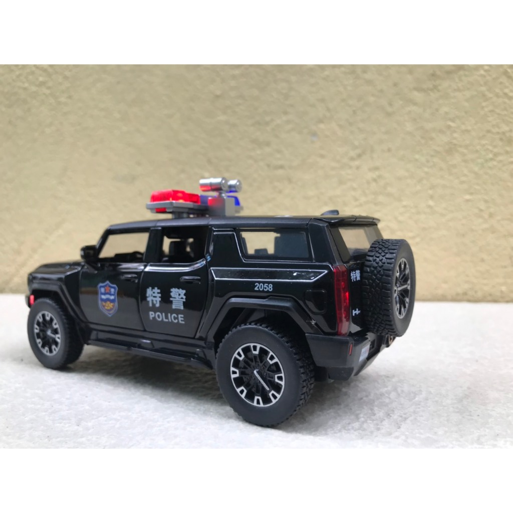Mô hình xe Cảnh Sát GMC HUMMER EVs - 1:32