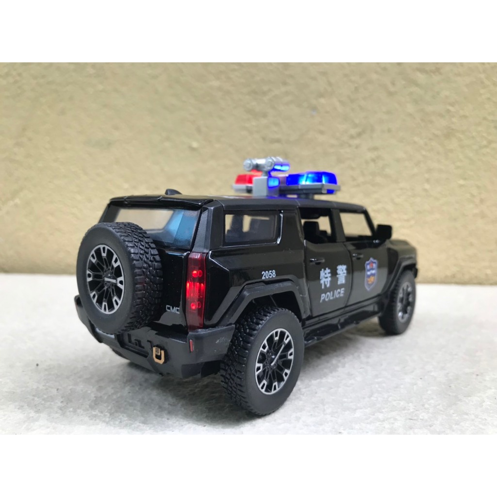 Mô hình xe Cảnh Sát GMC HUMMER EVs - 1:32
