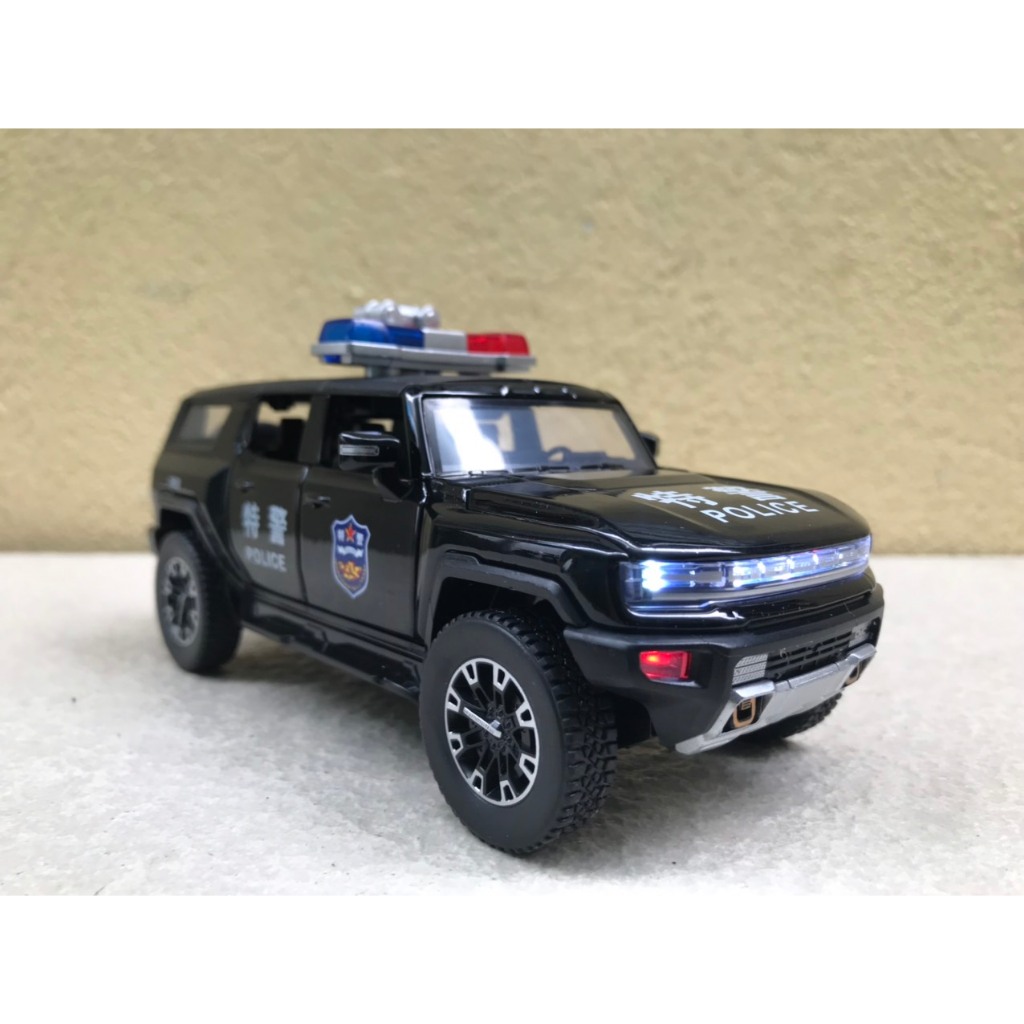 Mô hình xe Cảnh Sát GMC HUMMER EVs - 1:32