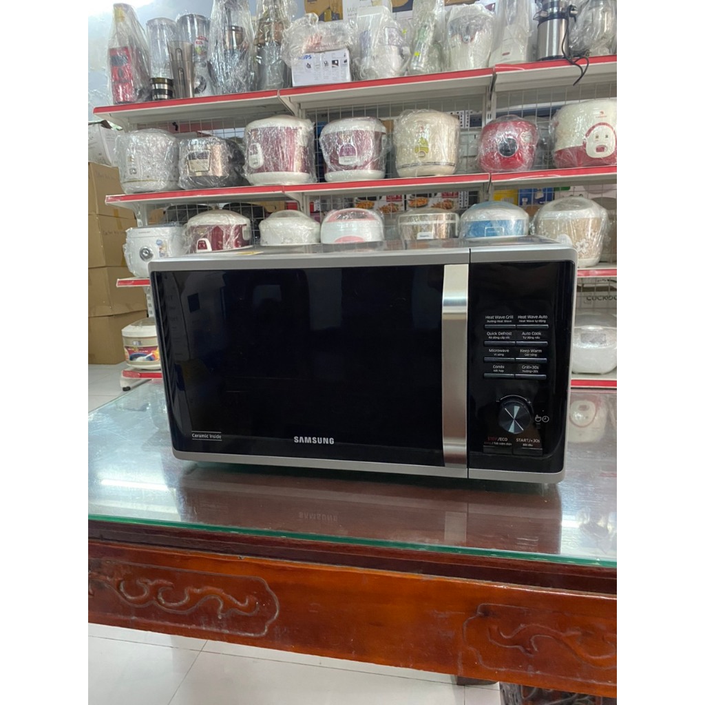 Lò vi sóng có nướng Samsung MG23K3575AS/SV-N 23 lít Malaysia - Hàng trưng bày