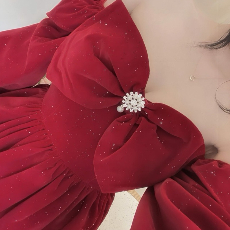 Váy nhung 3 tầng xòe nơ ngực