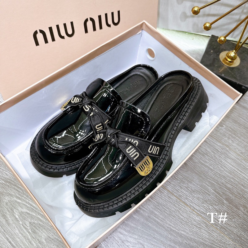 Giày sục nơ da bóng Miumiu
