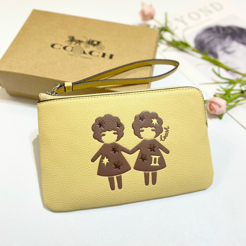 Ví coach móc tay theo cung hoàng đạo