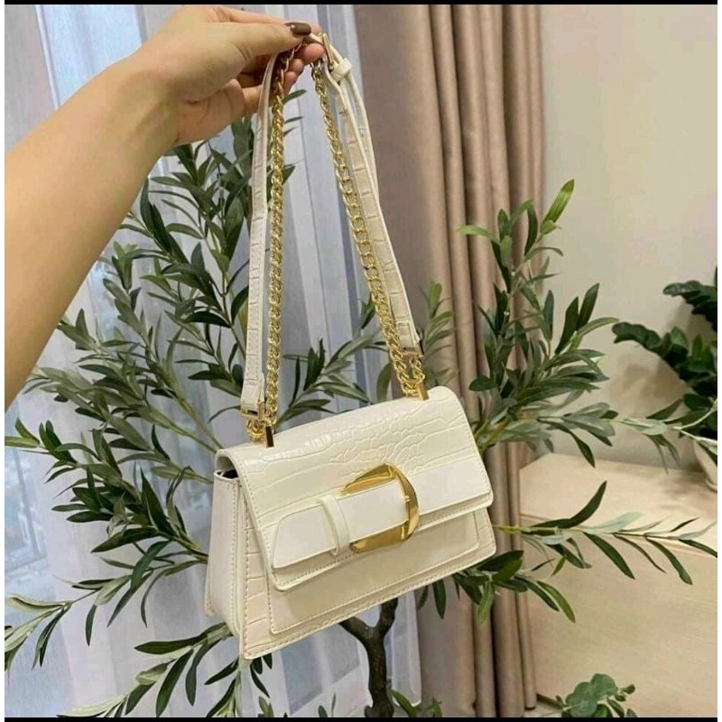 Túi khóa ngang vân cá sấu.