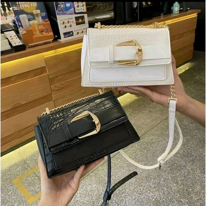 Túi khóa ngang vân cá sấu.