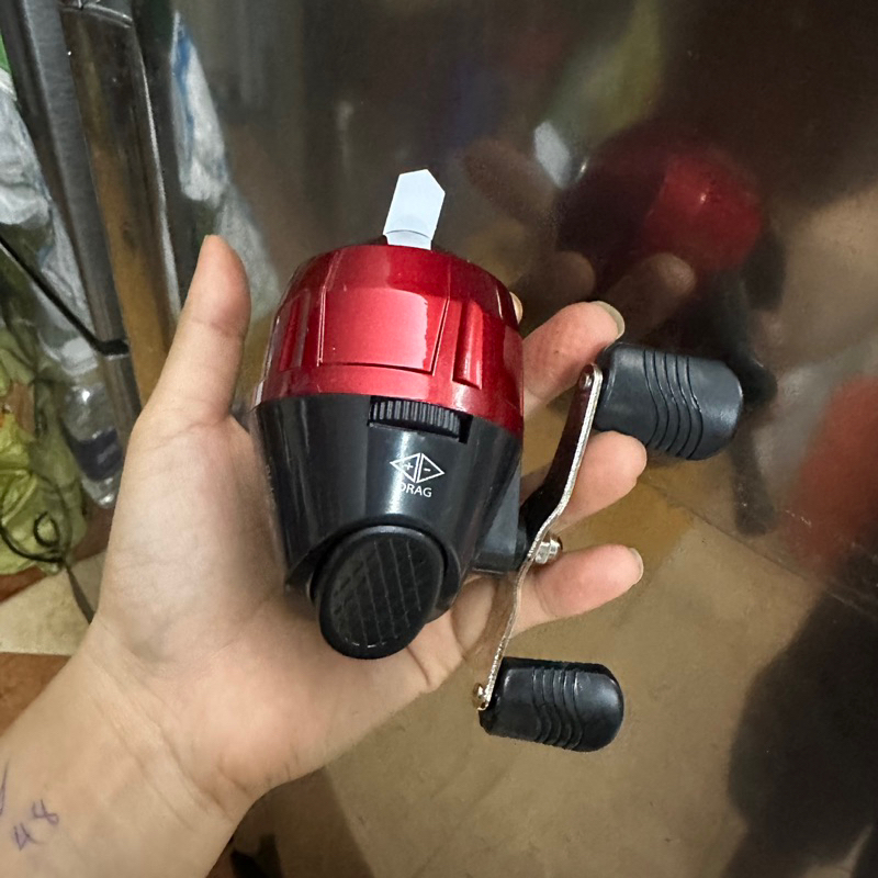 Máy bắt cá có sẵn 25m dây cước màu đỏ
