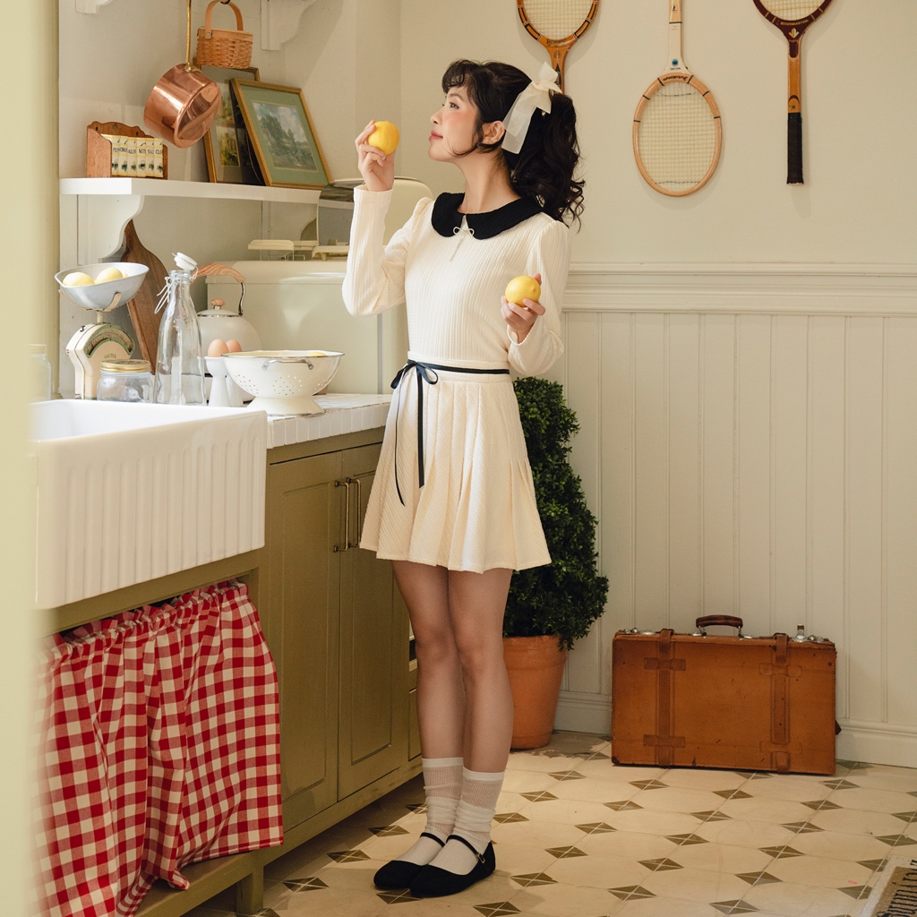 BLEUBIRD Set gồm áo và chân váy xếp ly vải len cotton Diane Set