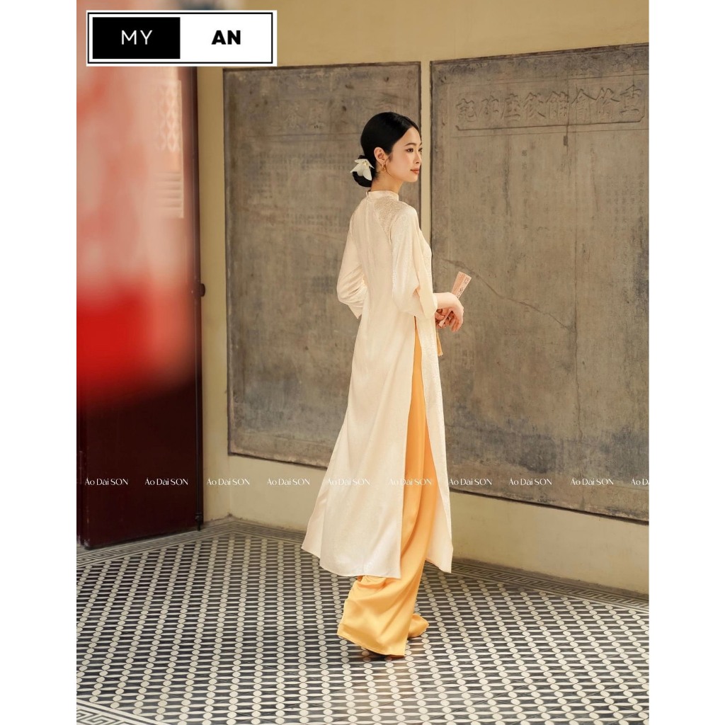 Áo dài cách tân dáng xuông gấm hoa gió mềm mại thanh lịch