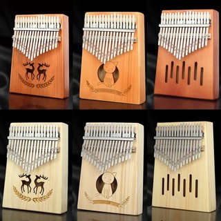  Đàn Kalimba gỗ nguyên khối 17 phím tặng kèm búa chỉnh âm túi đựng khăn lau giấy dán nốt nhạc 