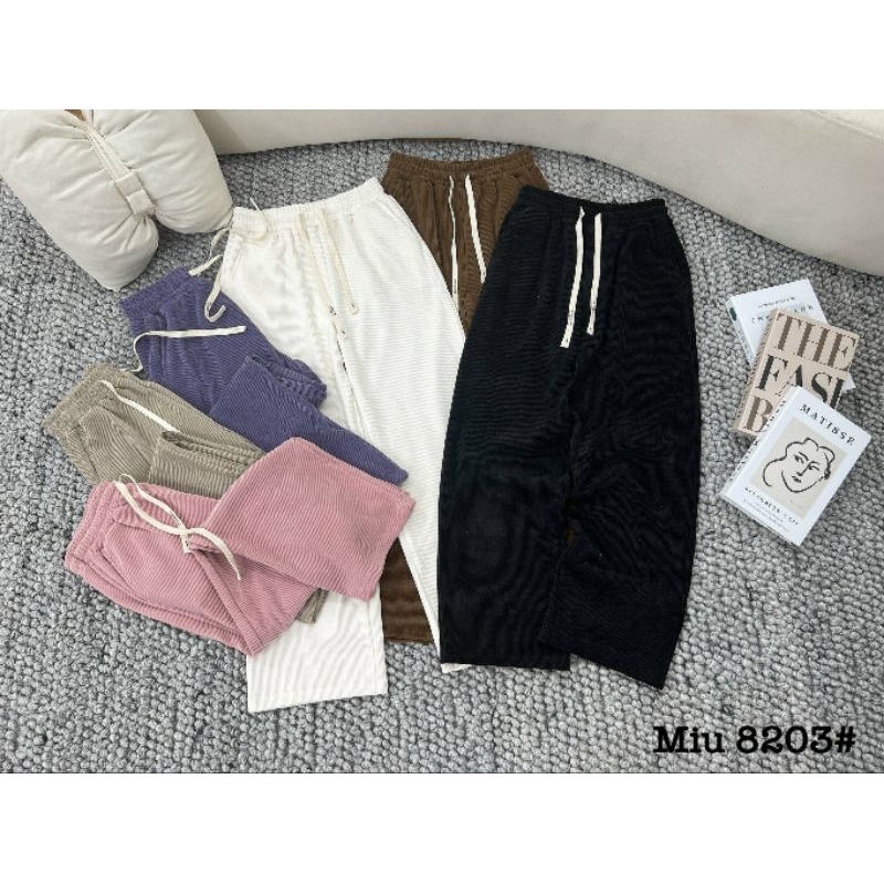 Quần nỉ tăm suông cạp chun hàng QC