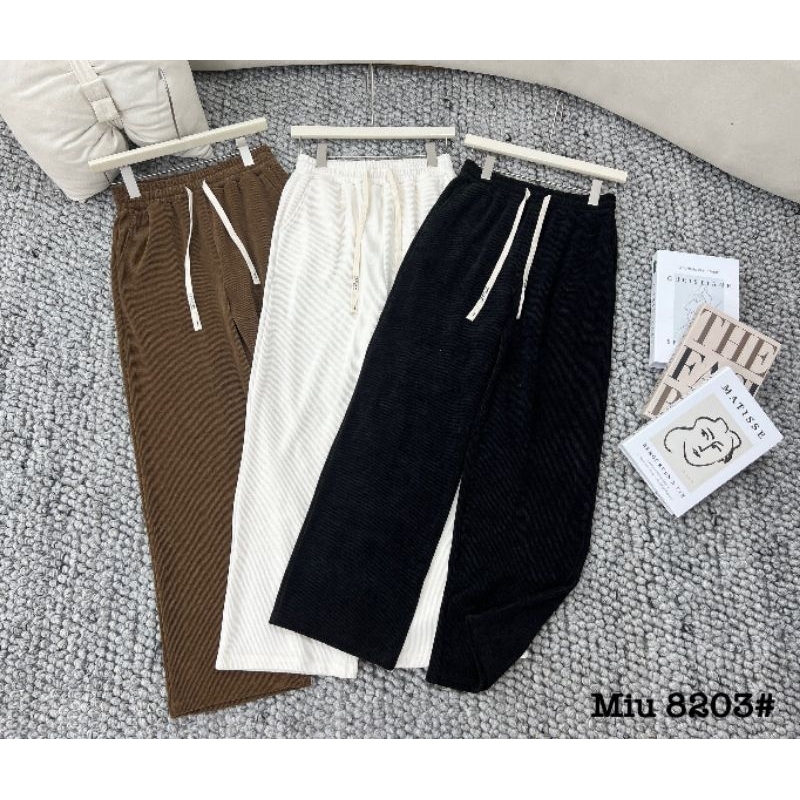 Quần nỉ tăm suông cạp chun hàng QC