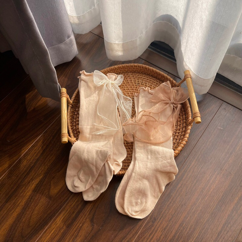 Tất đùi đính nơ cho bé gái