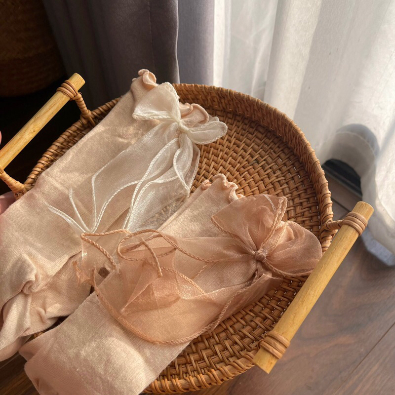 Tất đùi đính nơ cho bé gái