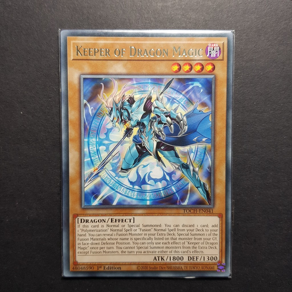 Lá bài Keeper of Dragon Magic - TOCH-EN041 - Rare 1st Edition