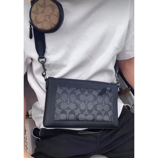 Túi đeo chéo COAch nam holden kèm charm tròn