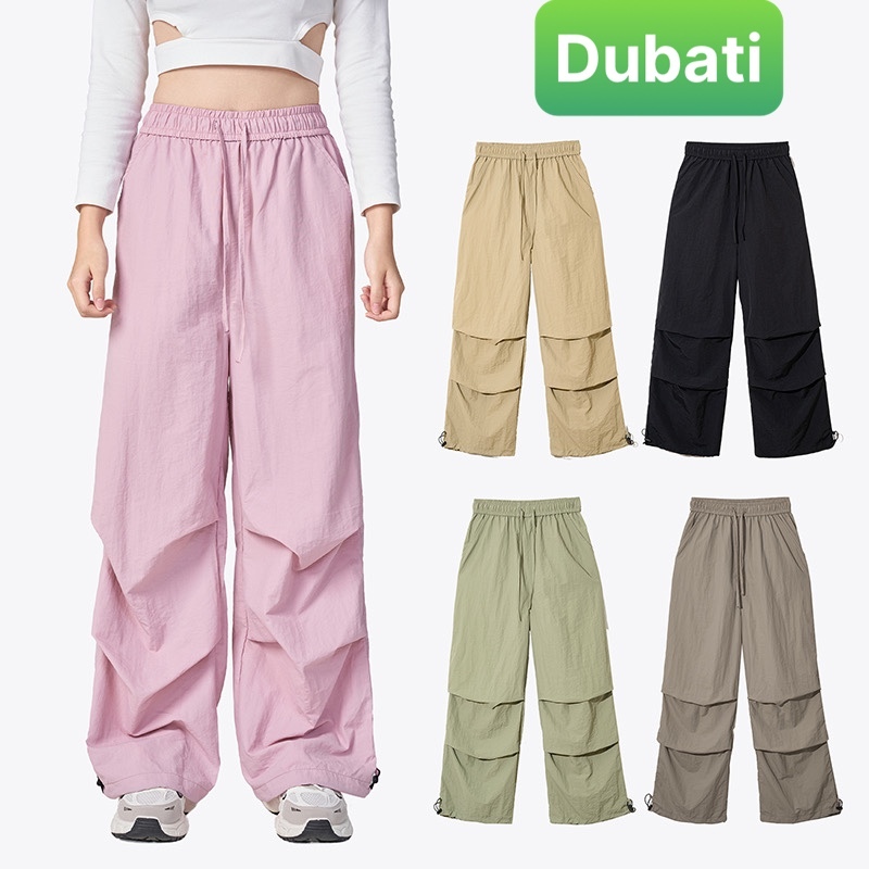QUẦN KAKI VẢI GIÓ NAM NỮ UNISEX ỐNG RỘNG XẾP LY HOT TREND SÀNH ĐIỆU MỚI 2024 - DUBATI FASHION