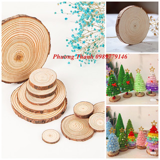 1 lát gỗ tròn làm đế cây thông noen