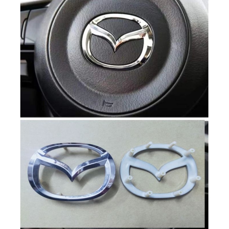 logo vô lăng ( túi khí ) mazda