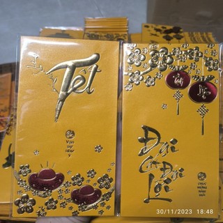Combo 30 bao lì xì màu vàng in nhũ nổi