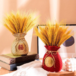 Bình hoa hình túi tiền vàng trang trí