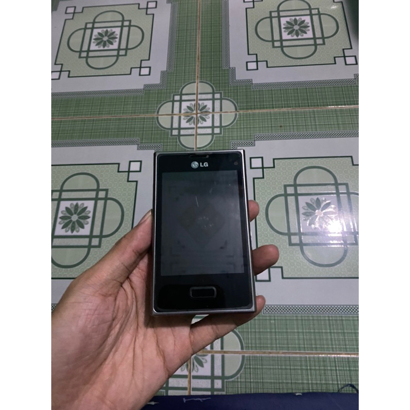 Điện thoại LG E400 zin nguyên tem bọc keo toàn thân