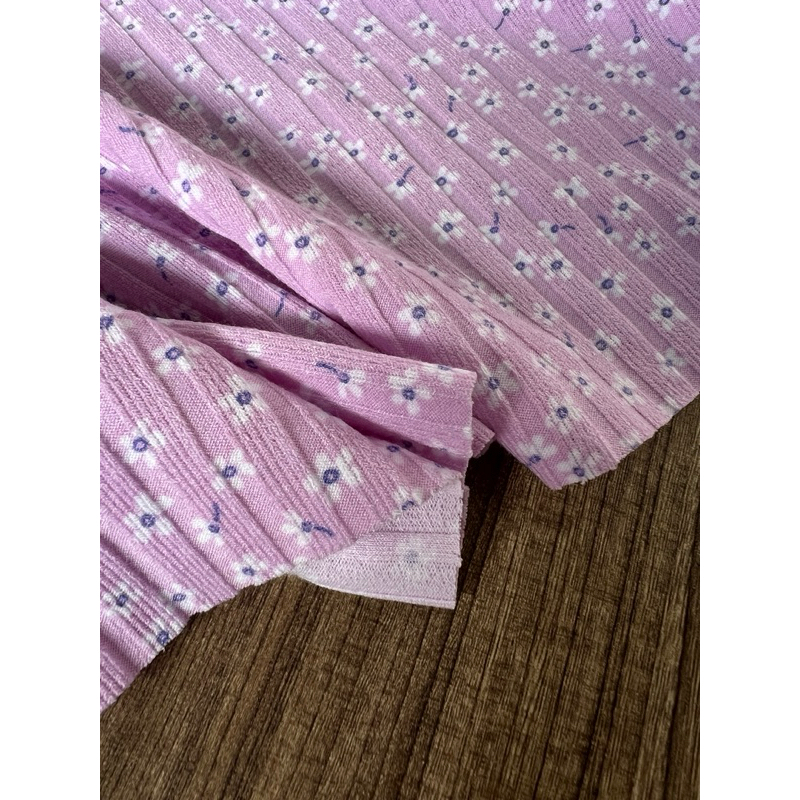 Vải thun gân hoa nhí nền màu tím cà