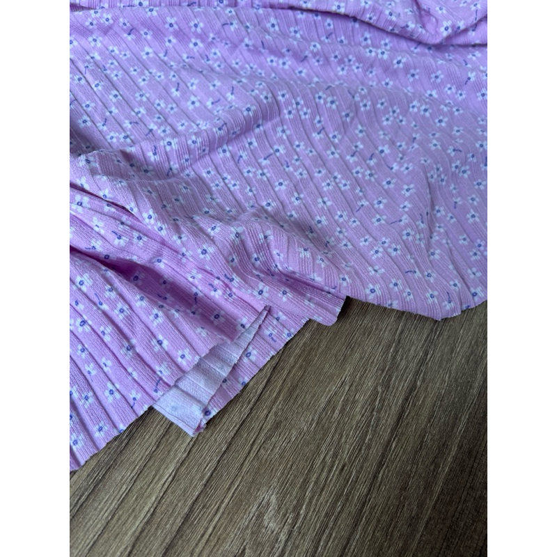 Vải thun gân hoa nhí nền màu tím cà