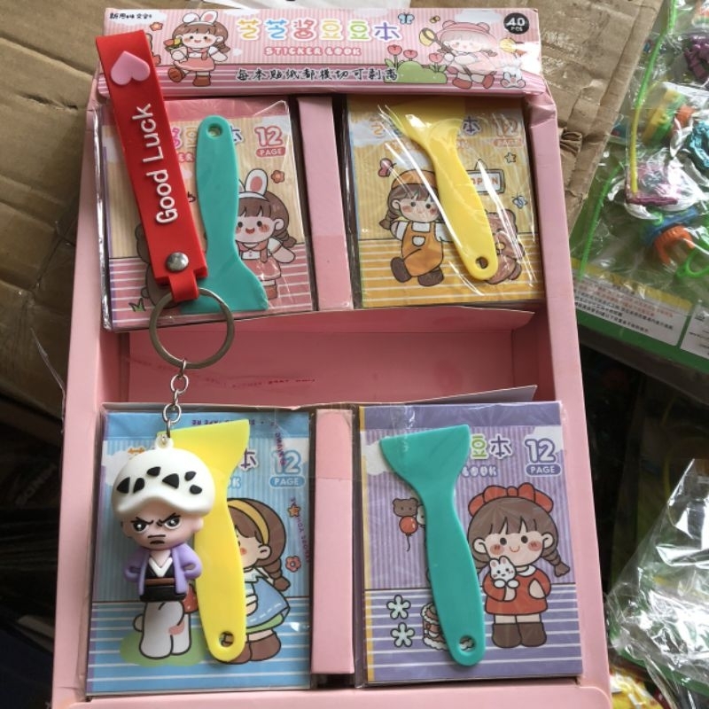 Tập 40 quyển dán kèm gạt