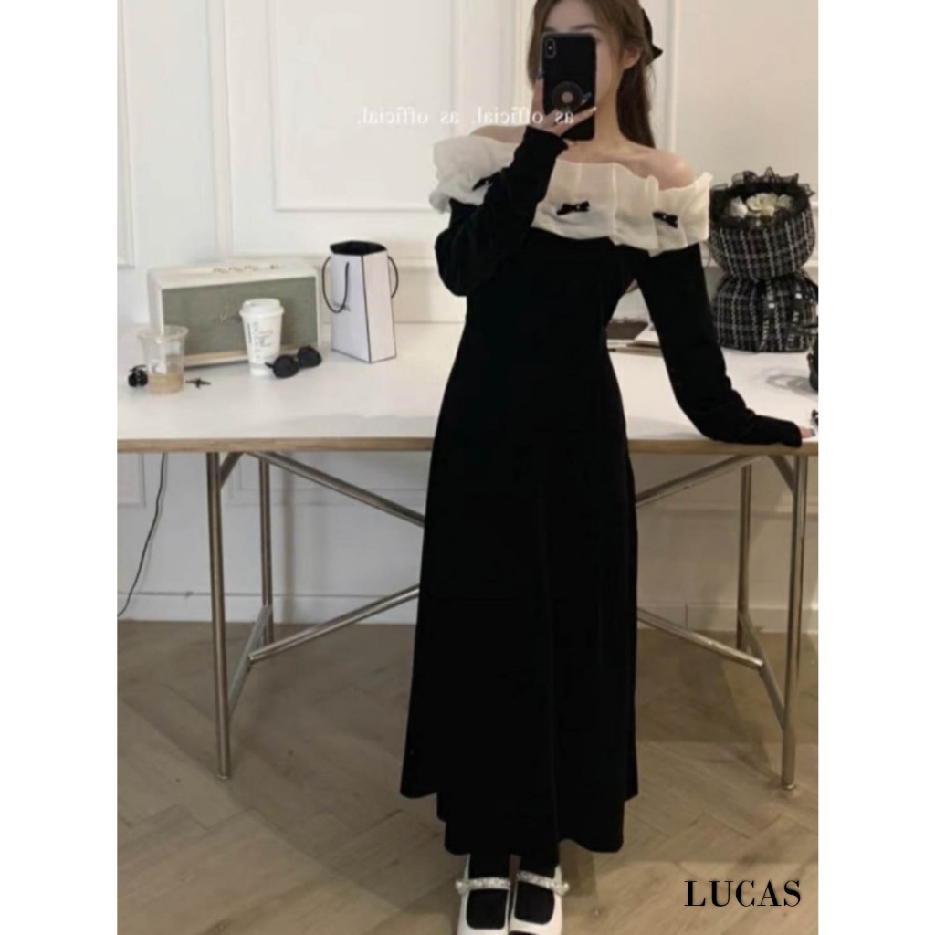 Váy đen trễ vai bèo trắng xếp ly tay dài