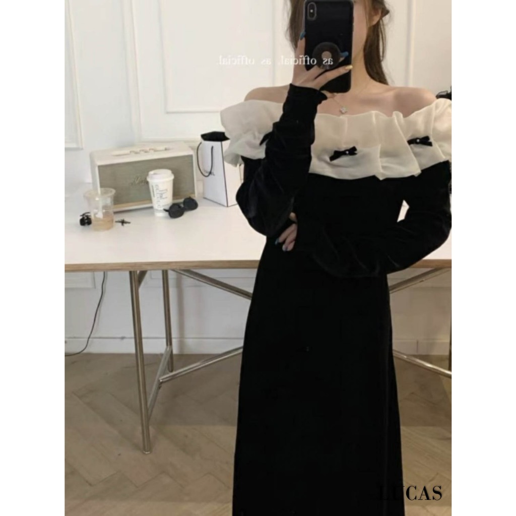Váy đen trễ vai bèo trắng xếp ly tay dài