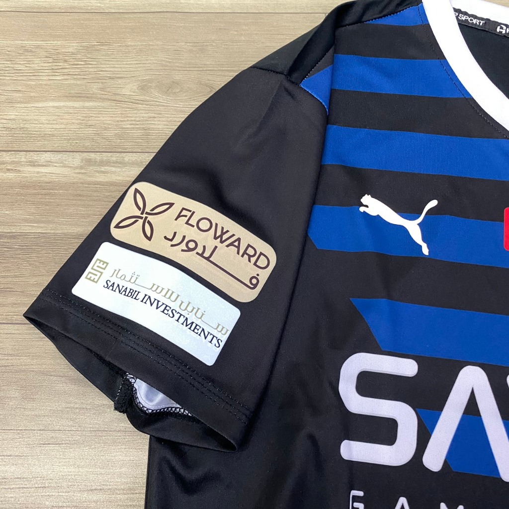 Bộ quần áo bóng đá Al Hilal đen sọc xanh sân khách 2024 HP FLG