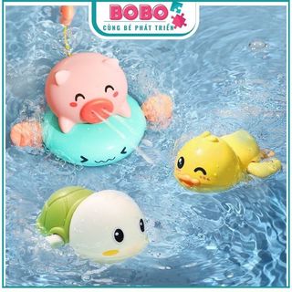 Đồ chơi nhà tắm heo con, bò sữa chèo thuyền và phun nước, cá heo, rùa, vịt vặn cót cho bé
