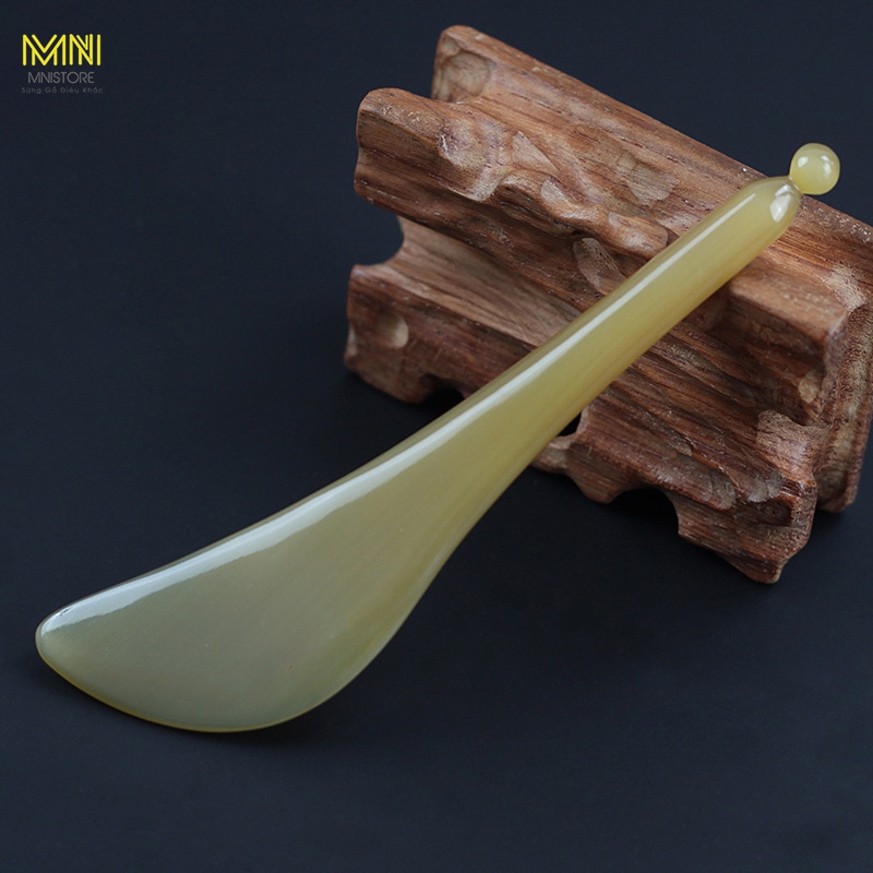 Cây massage sừng bi, kích thước 12 - 13,5cm, độ dày 2,6 - 9mm, màu sắc trắng lưa giảm quầng thâm bọng mắt, giảm sưng