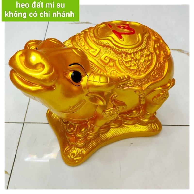 HEO ĐẤT TIẾT KIỆM HÌNH CHÚ TRÂU TÀI LỘC CHẤT LIỆU THẠCH CAO VÀNG ĐẸP CHUẨN MÀU( DÀI 30 CM NGANG 17 CM )